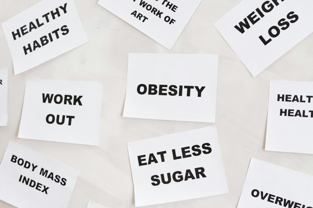 Conceptual image featuring motivational cards on health, fitness, and wellness on a white background.